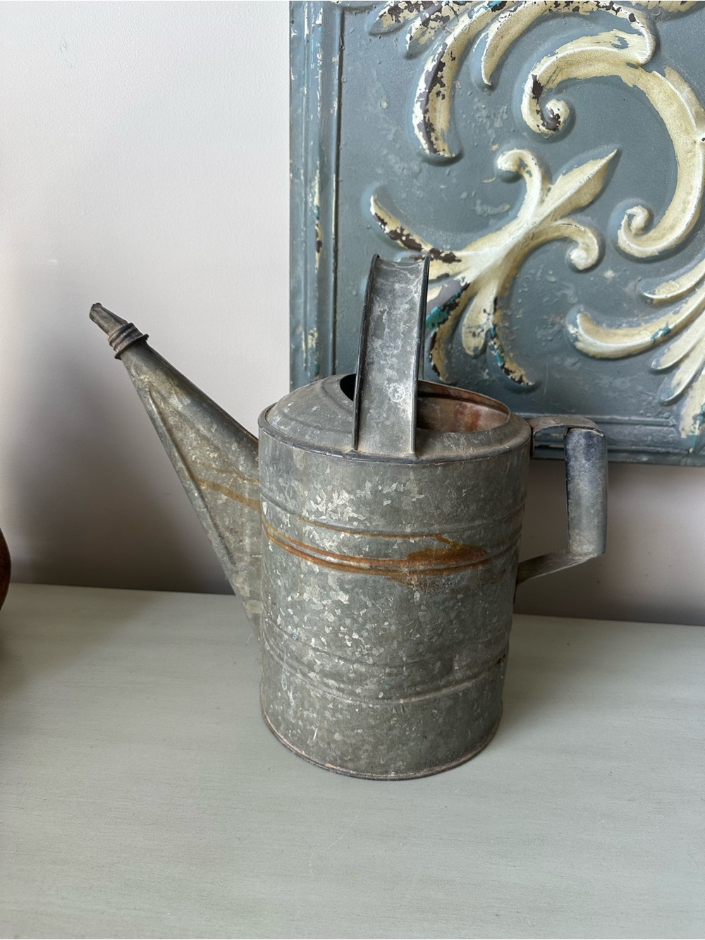 Antique galvanized watering can garden decor